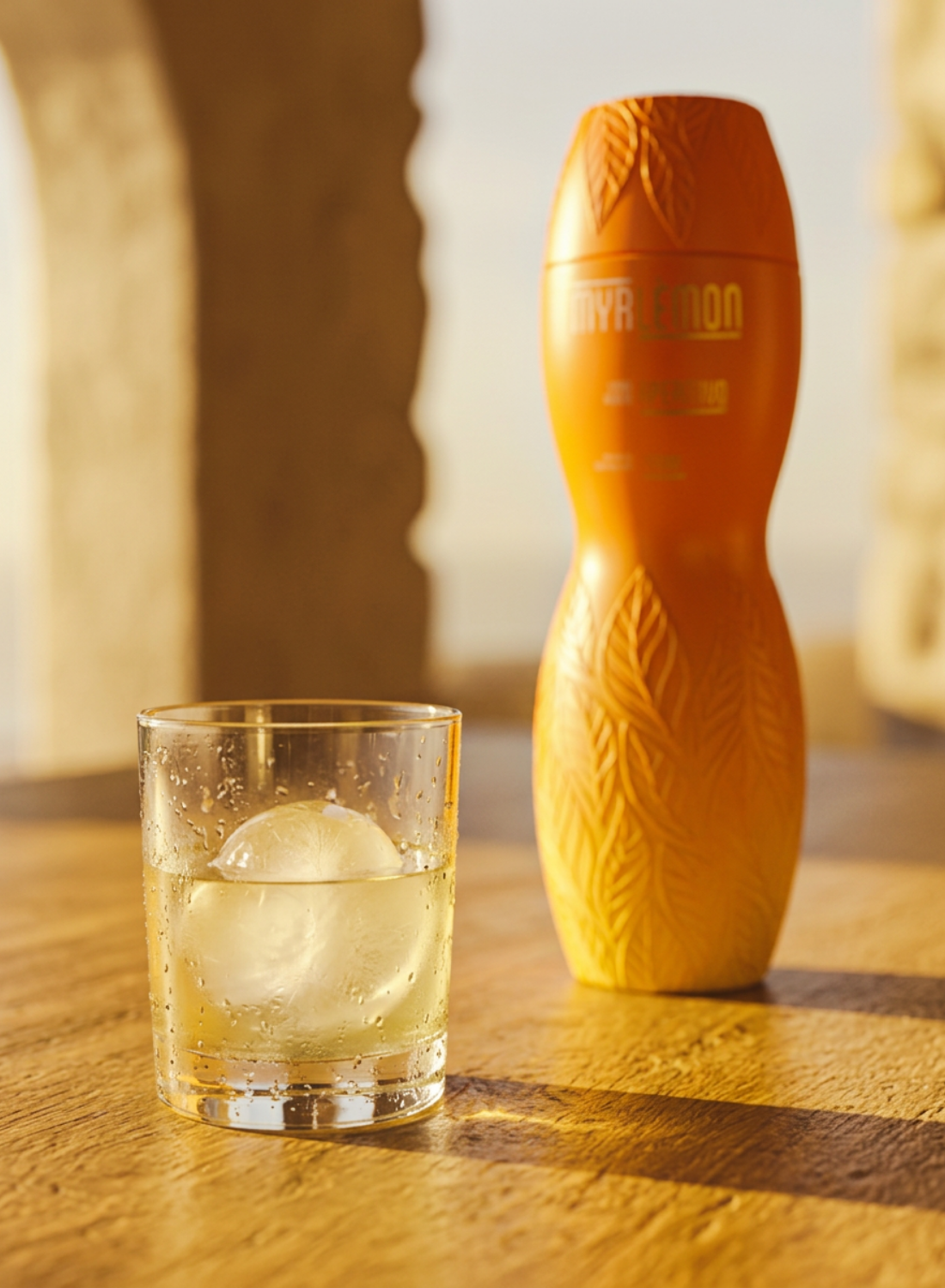 Myrlèmon served neat or over a large ice sphere in a chilled rocks glass.