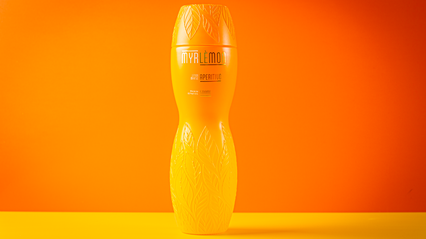 Yellow bottle with a textured surface on an orange background